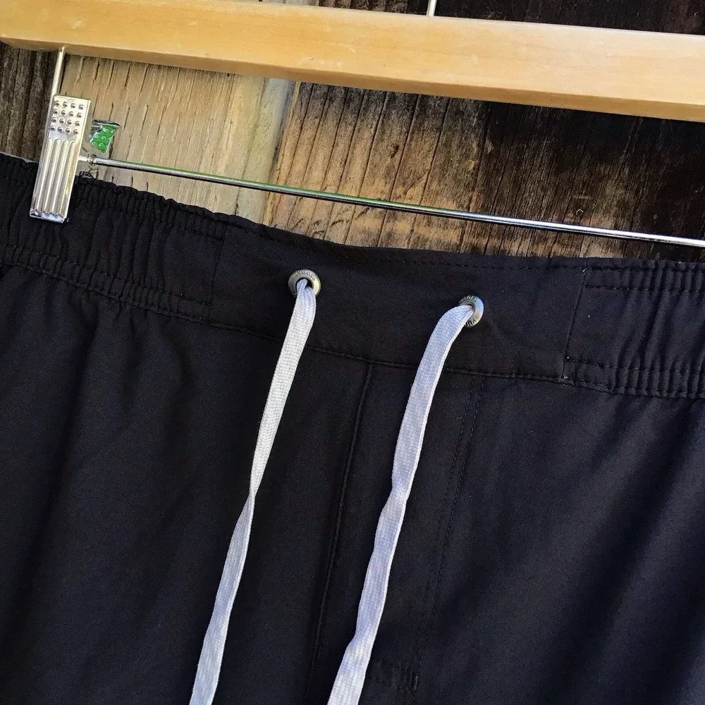 Vuori Black Athletic Shorts with Light Gray Drawstring
